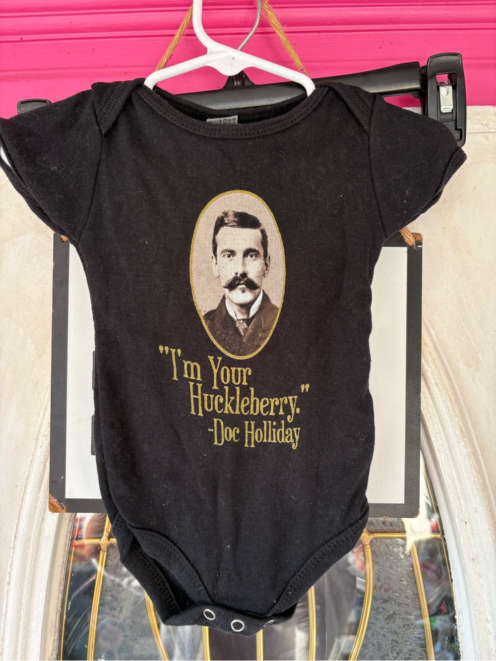 Gildan Black Baby One-Piece with Gold Doc Holliday Graphic